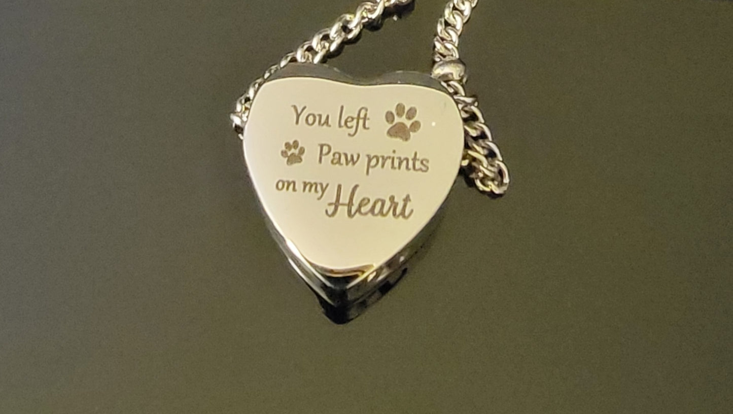 Heart shaped Cremation Urn Necklace for ashes "You left paw prints on my heart"