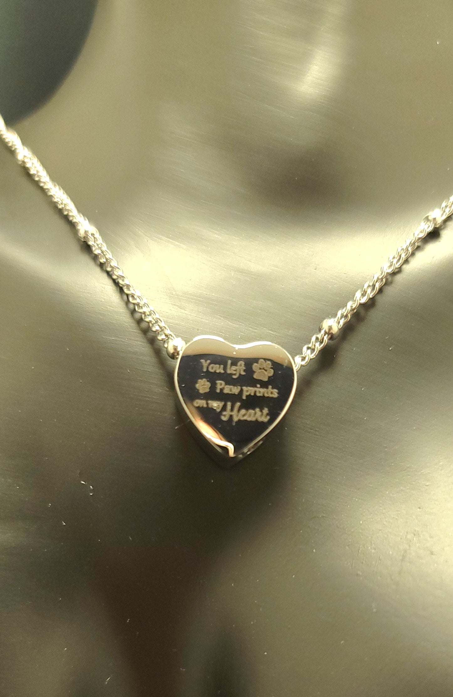 Heart shaped Cremation Urn Necklace for ashes "You left paw prints on my heart"